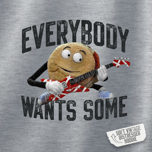 Closeup view of Heather Gray Soft Hoodie Sweatshirt featuring Better Off Dead movie vintage Van Halen guitar Everybody Wants Some graphic with pig burger.