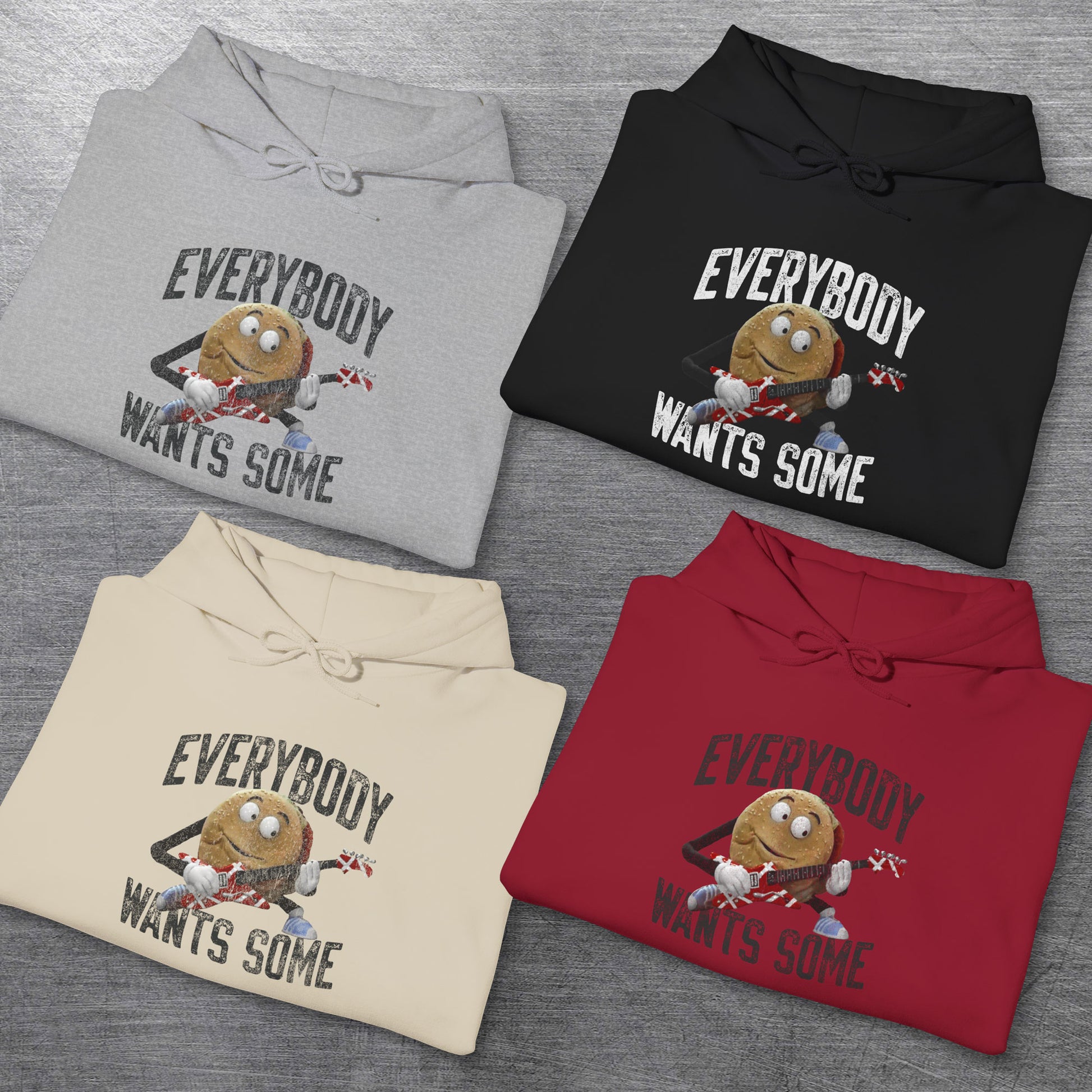 Four folded Soft Hoodie Sweatshirts featuring Better Off Dead movie vintage Van Halen guitar Everybody Wants Some graphic with pig burger.