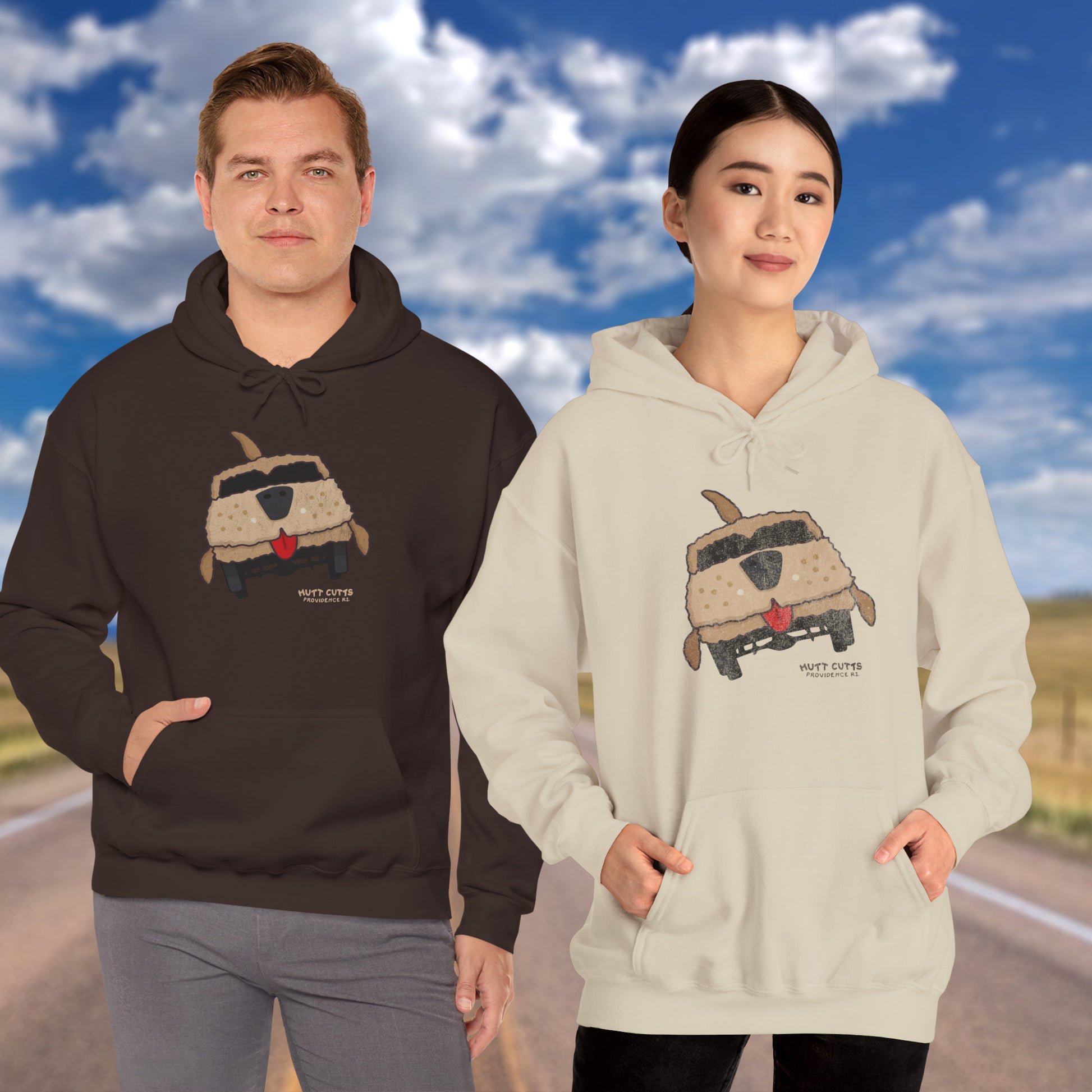 Two people wearing Gildan 18500 hoodies with vintage distressed Mutt Cutts dog van graphic inspired by Dumb and Dumber movie.