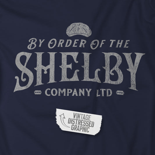 Closeup view of a Shelby Company Ltd vintage distressed logo graphic from Peaky Blinders, featuring flat cap and razor blades.