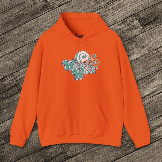 Orange Gildan 18500 pullover hoodie with vintage distressed Water Wizz logo from Grown Ups on the chest, shown on wood floor.