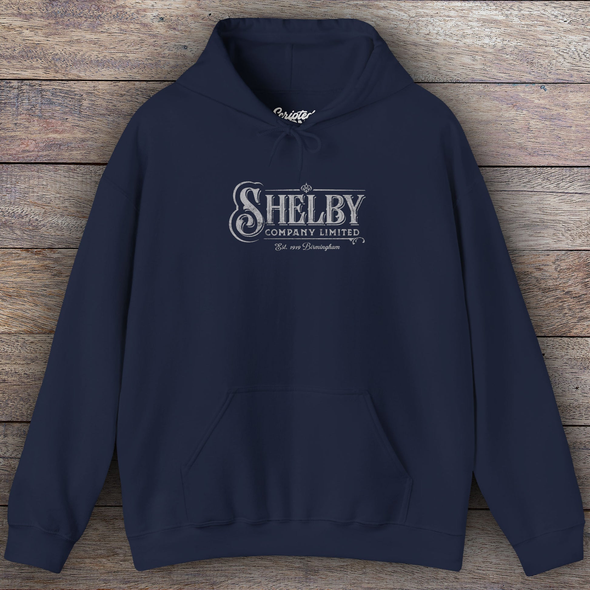 Navy blue colored Soft Unisex Hoodie Heavy Blend Hooded Sweatshirt featuring the fictional logo Shelby Company Limited from the TV series Peaky Blinders in a vintage distressed style.