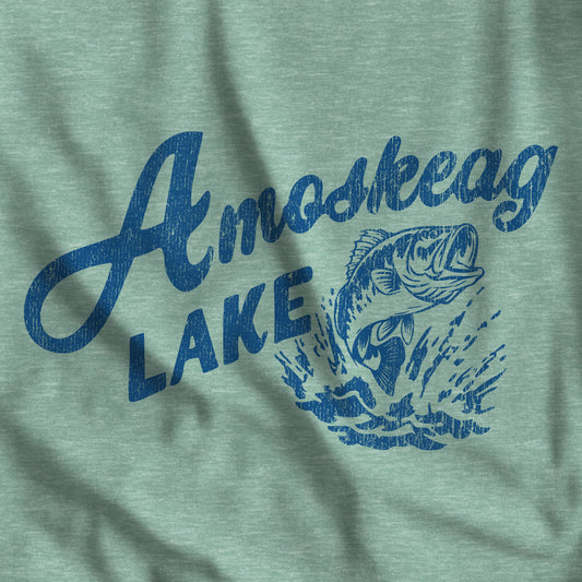 Closeup of green t-shirt featuring the Amoskeag Lake logo graphic worn by Salma Hayek in the movie Grown Ups in a vintage distressed style.