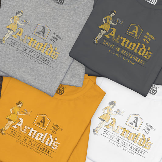 Group of 4 folded vintage Arnold’s Drive-In t-shirts inspired by TV show Happy Days.