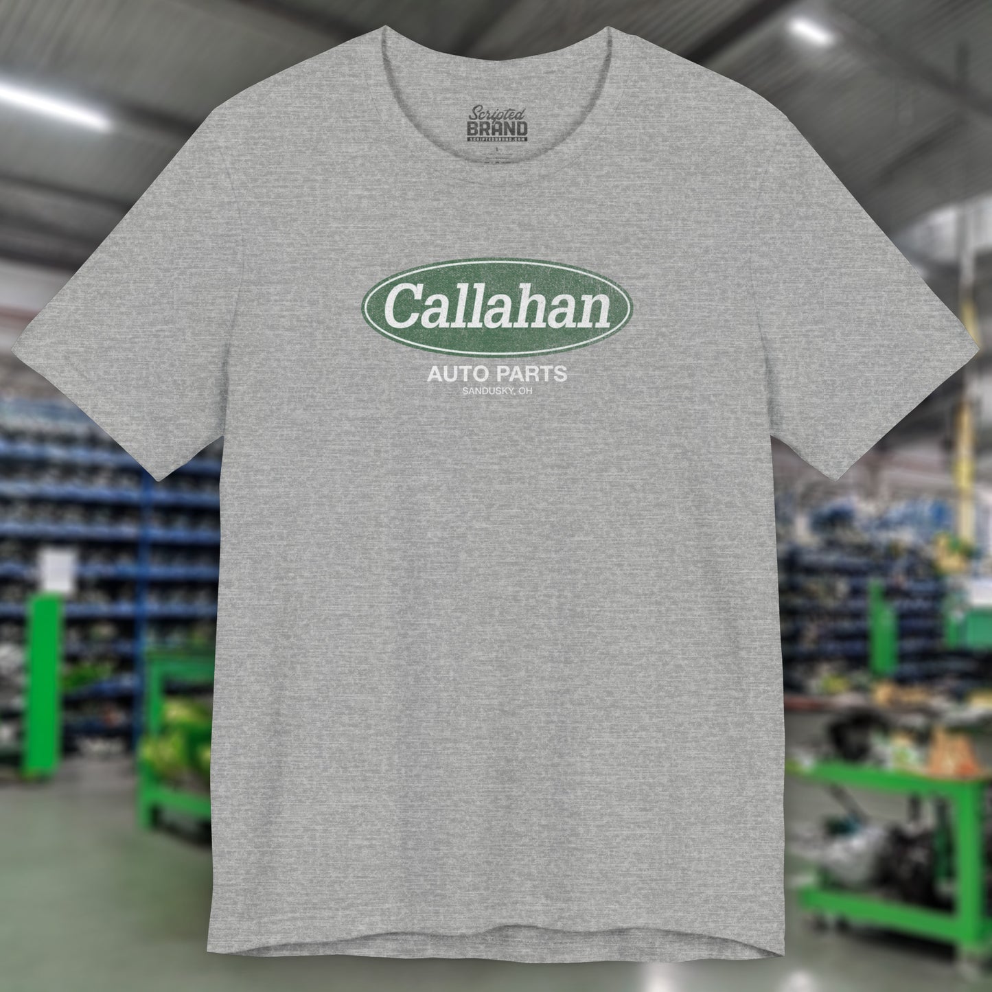 Front view of a Athletic Heather Gray t-shirt with the Callahan Auto Parts logo from the movie Tommy Boy in a vintage distressed style.