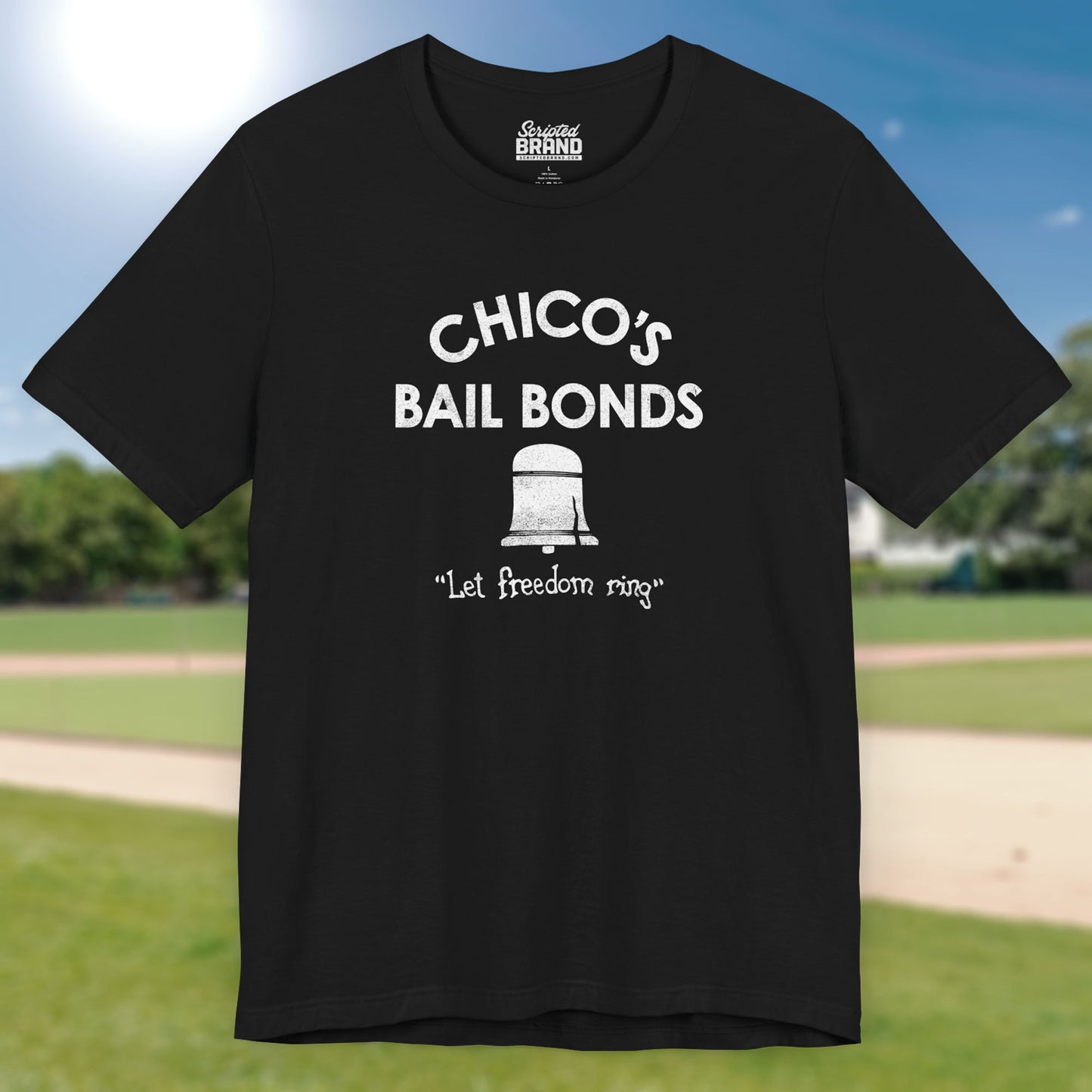 Front view of black t-shirt with distressed Chico’s Bail Bonds logo and “Let freedom ring” slogan from The Bad News Bears movie.