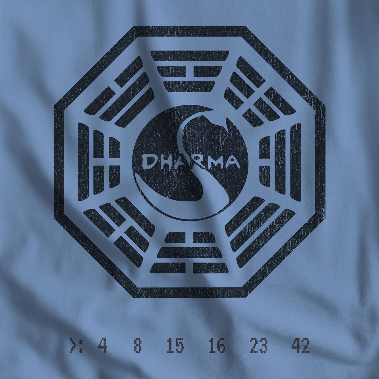 Closeup view of Lavender Light Blue bella+canvas soft t-shirt featuring a distressed Dharma Initiative swan logo graphic from the TV show LOST.