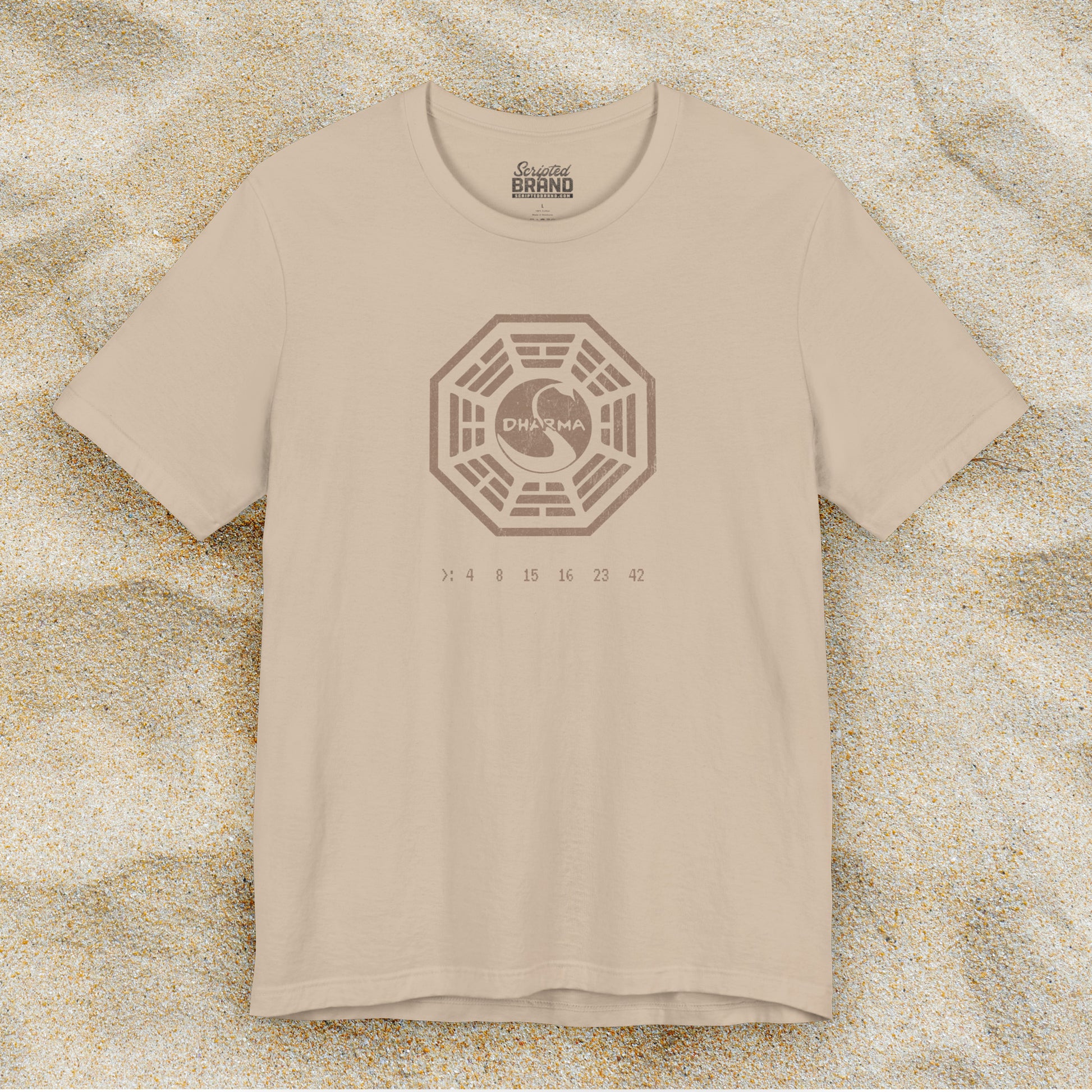 Tan short-sleeve t-shirt featuring the Dharma Initiative swan station logo graphic from the TV show LOST in a vintage distressed  style.