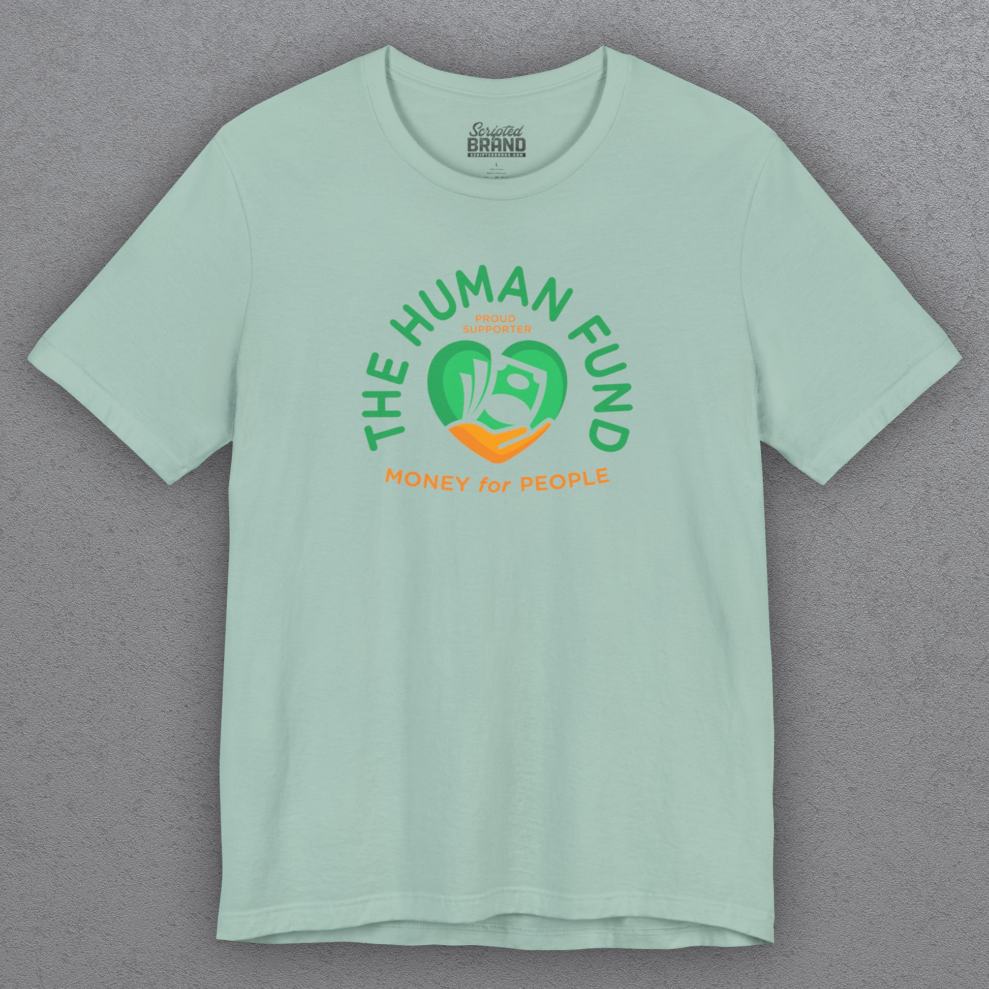 Light green t-shirt with 'The Human Fund' logo on a gray background