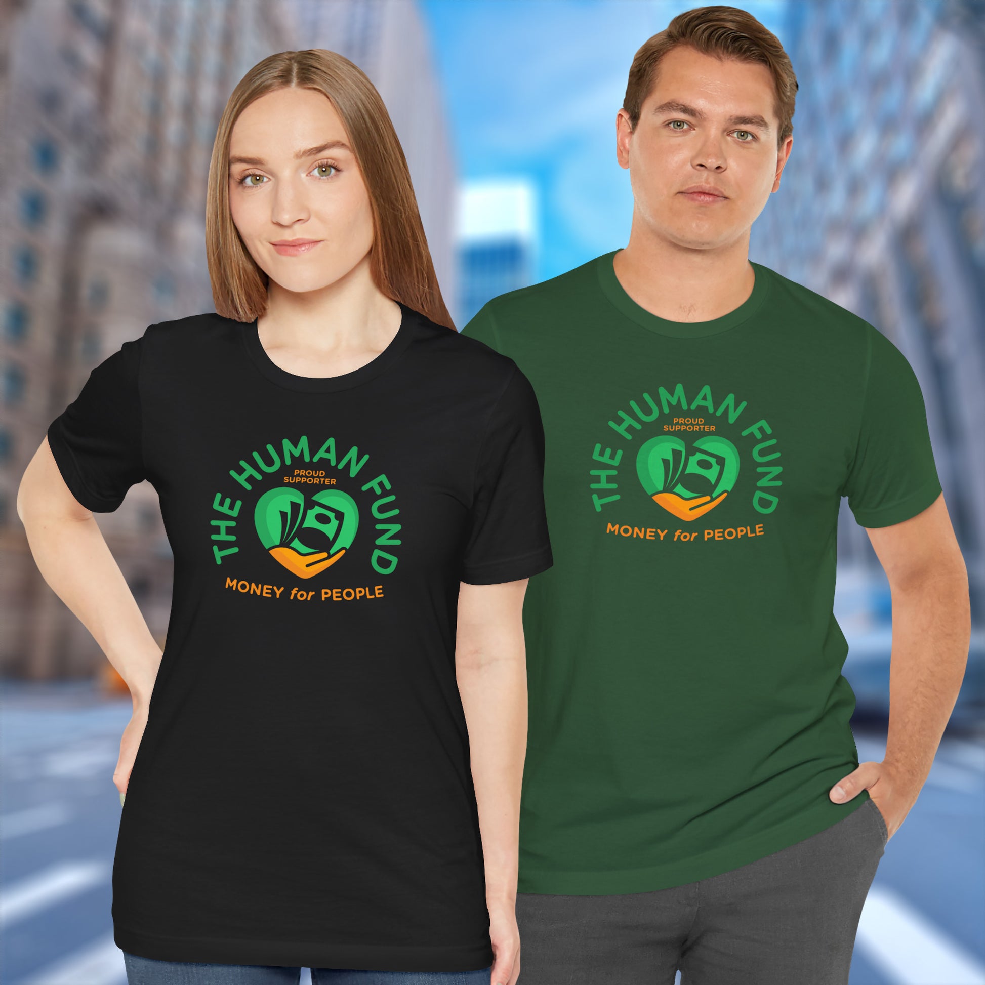 Two people wearing 'The Human Fund' t-shirts with a cityscape background