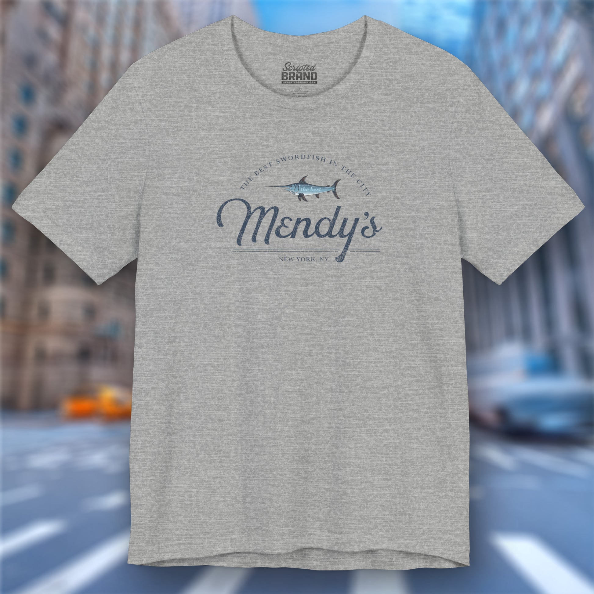 Front view of an athletic heather grey colored soft unisex Bella+Canvas 3001 short-sleeve t-shirt featuring a unique Mendy's Restaurant logo graphic, designed by ScriptedBrand in a vintage distressed style, and inspired by the TV show Seinfeld.