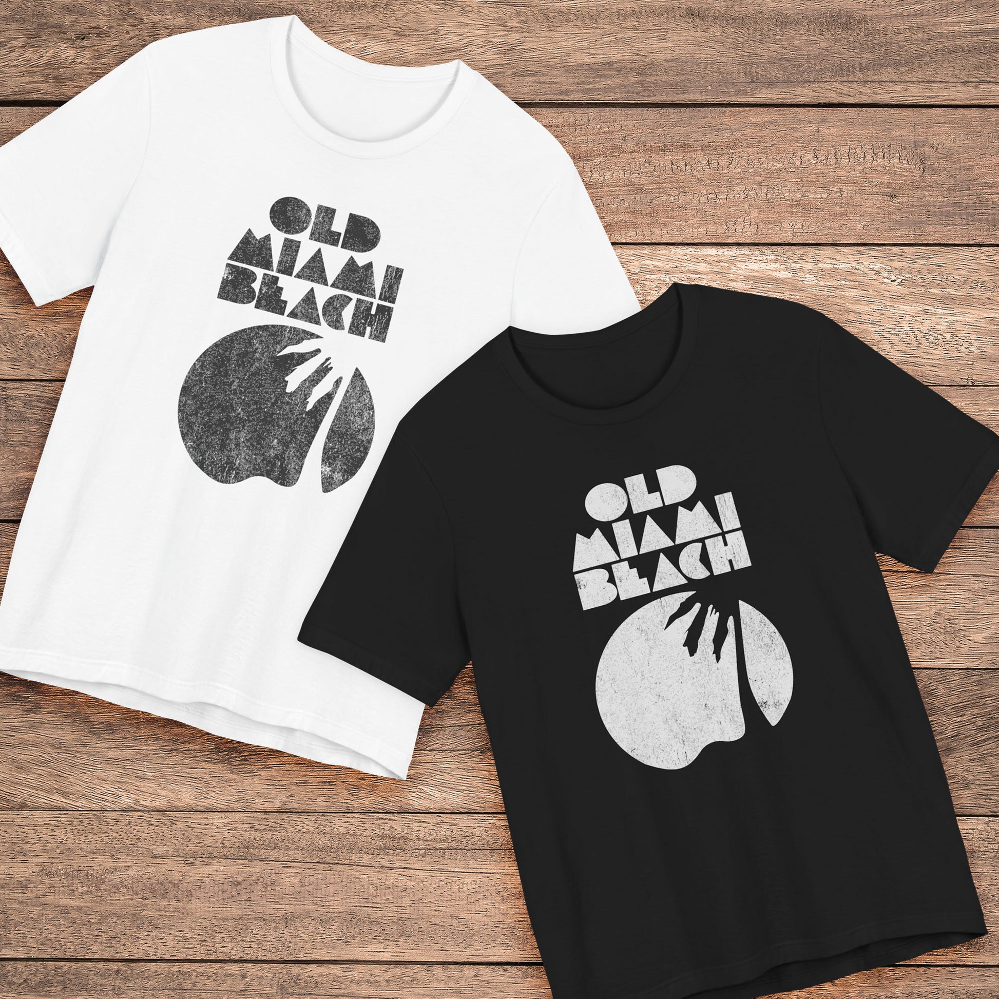 two Bella+Canvas 3001 T-shirts with distressed “Old Miami Beach” graphic, inspired by Julia Garner’s shirt in Weapons movie.