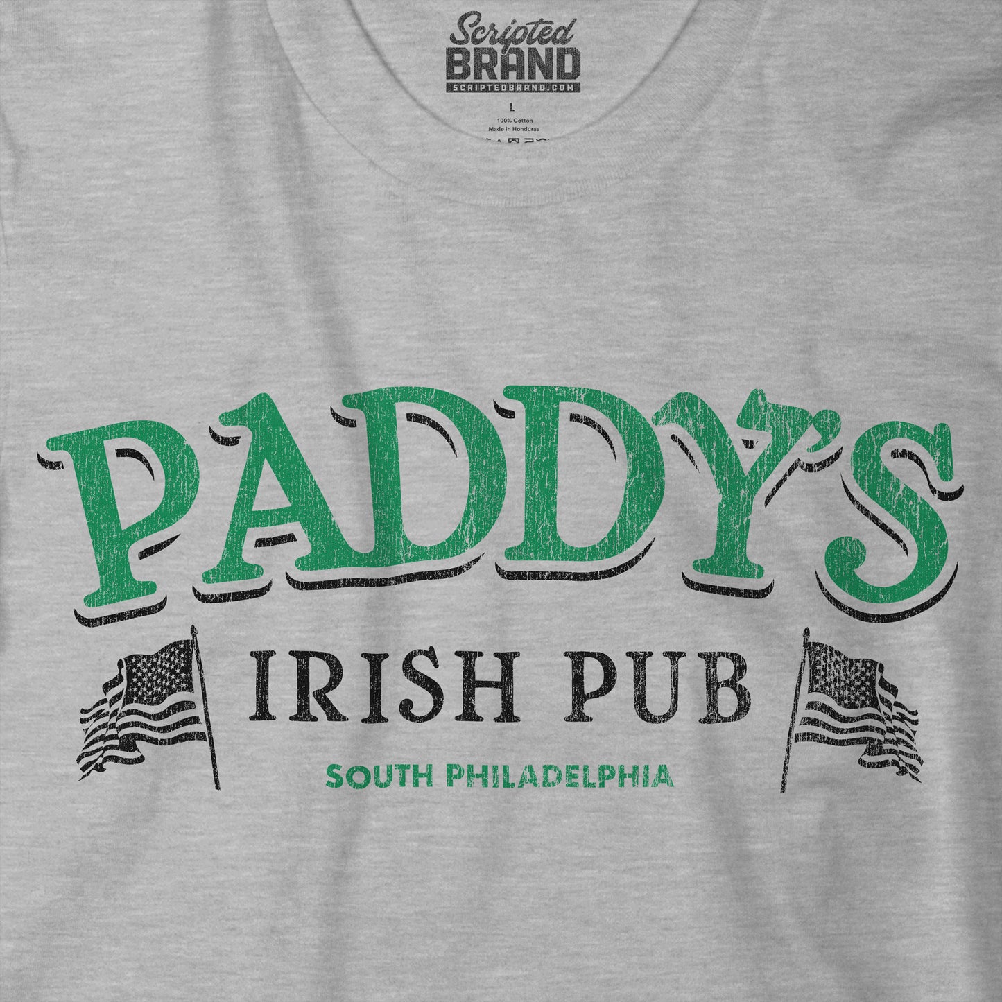 Closeup of Athletic Heather Gray t-shirt with vintage Paddy's Pub Irish Bar graphic inspired by It’s Always Sunny in Philadelphia.