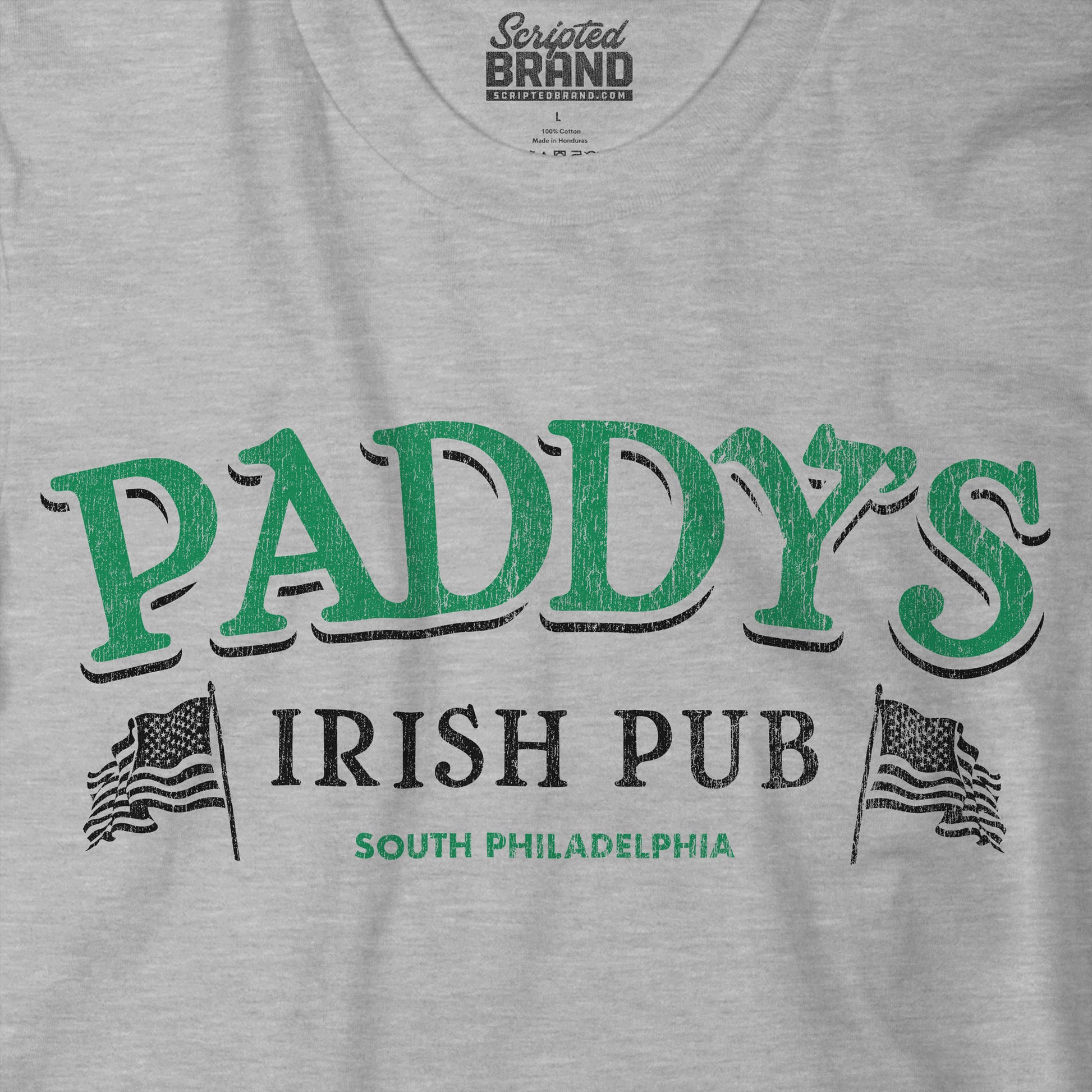 Closeup of Athletic Heather Gray t-shirt with vintage Paddy's Pub Irish Bar graphic inspired by It’s Always Sunny in Philadelphia.