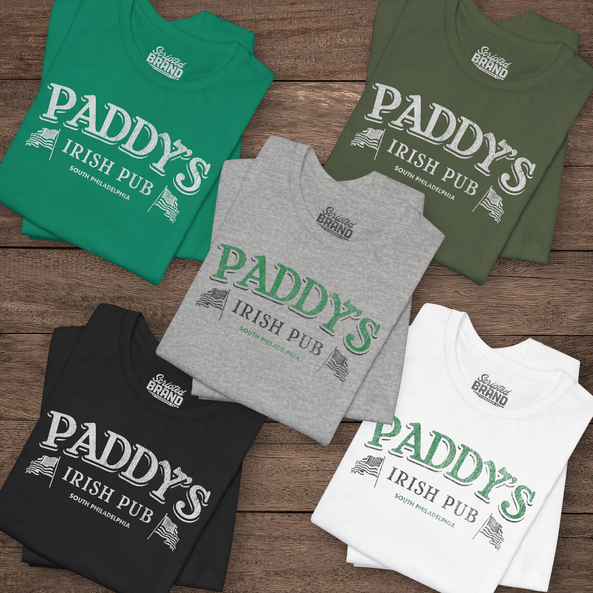 Four folded t-shirts with vintage Paddy's Pub Irish Bar graphic inspired by It’s Always Sunny in Philadelphia.