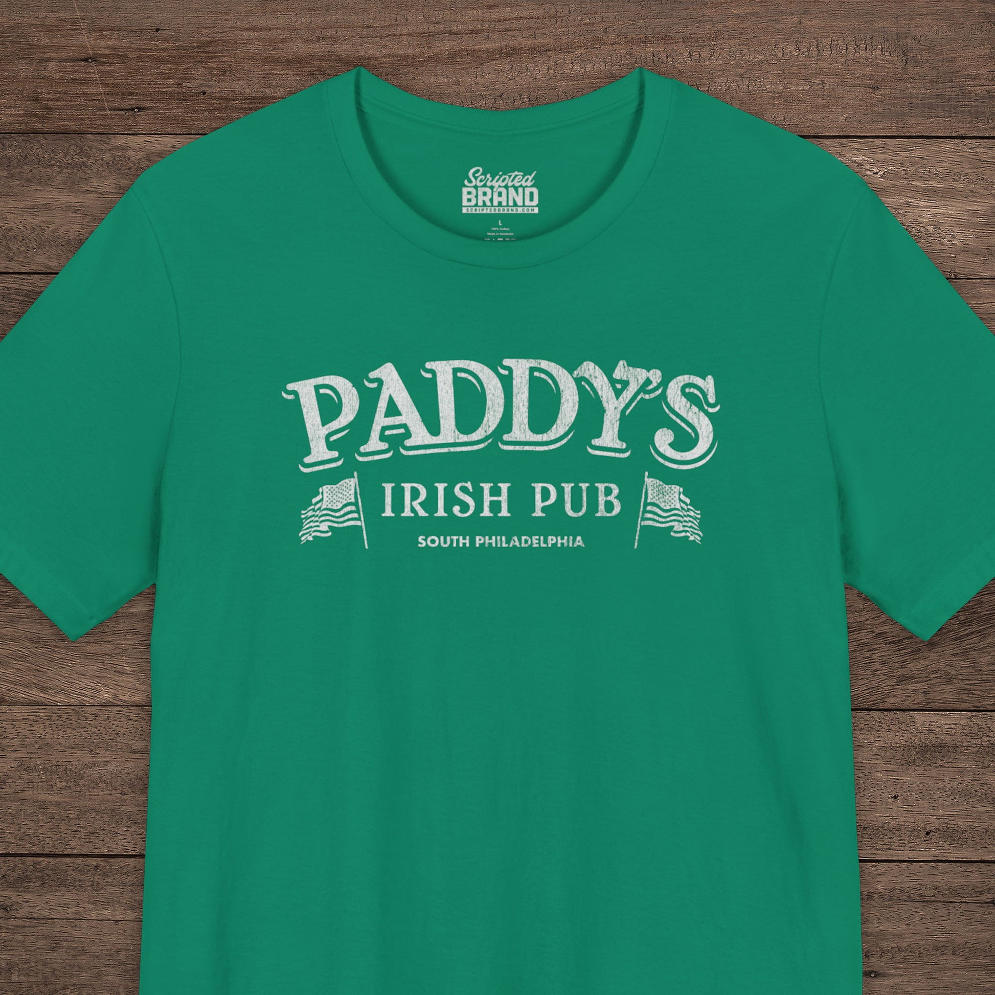 Green t-shirt with vintage Paddy's Pub Irish Bar graphic inspired by It’s Always Sunny in Philadelphia.
