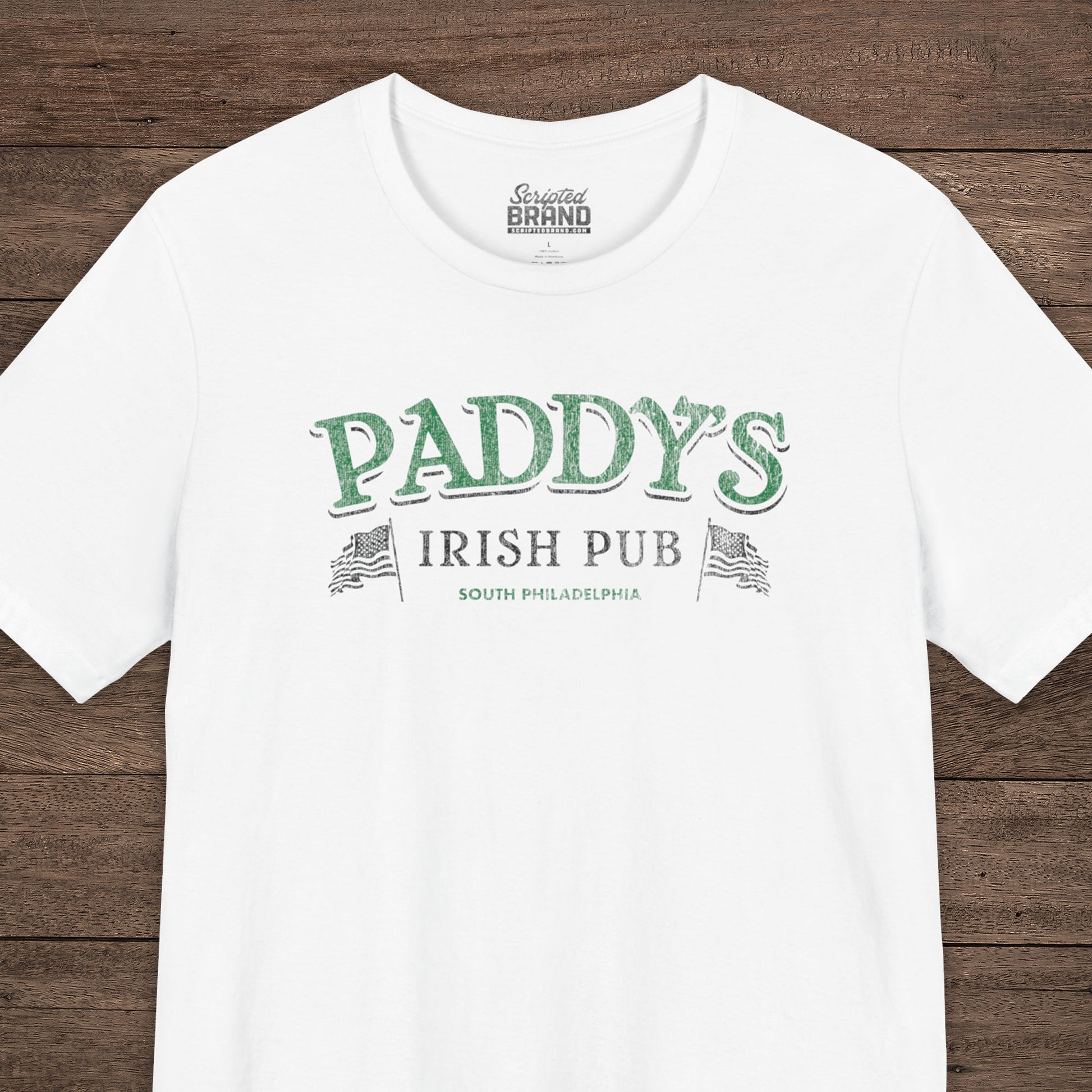 White t-shirt with vintage Paddy's Pub Irish Bar graphic inspired by It’s Always Sunny in Philadelphia.