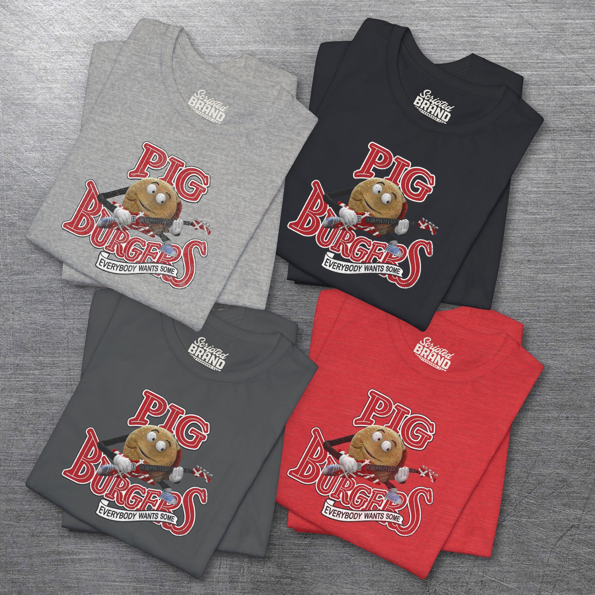 Four folded soft Bella Canvas Tees featuring vintage Pig Burgers logo with Van Halen guitar from the movie Better Off Dead.