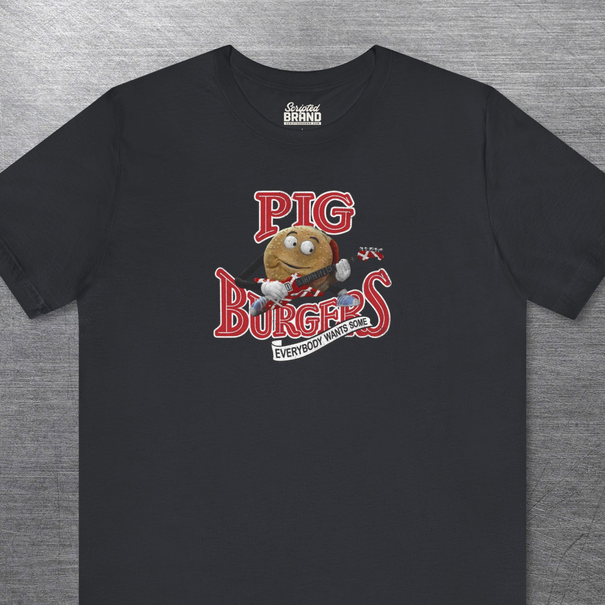 Black soft Bella Canvas Tee featuring vintage Pig Burgers logo with Van Halen guitar from the movie Better Off Dead.