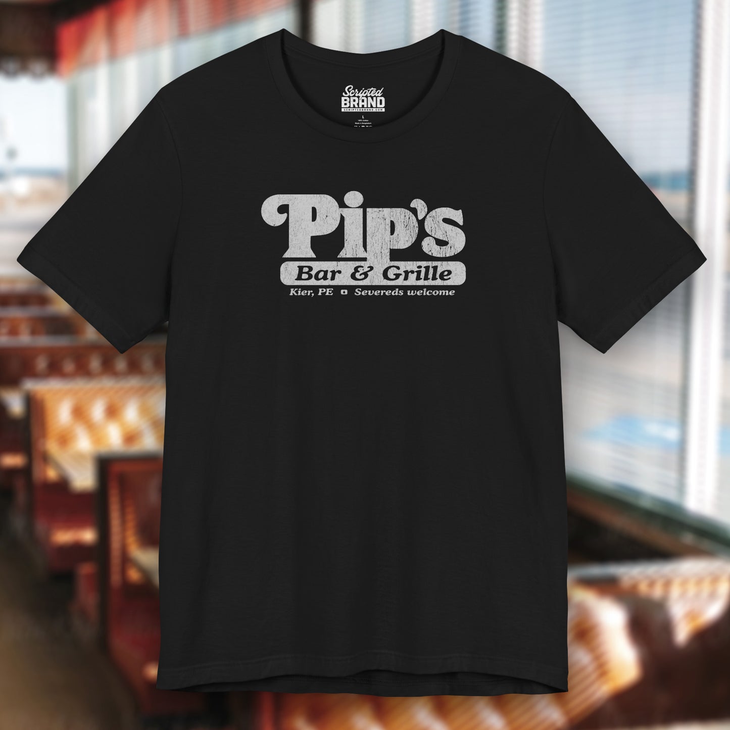 Black colored soft Bella+Canvas shirtsleeve t-shirt with the Pips Bar and Grill logo from the TV show Severance in a vintage distressed ink-stamped worn-in style.