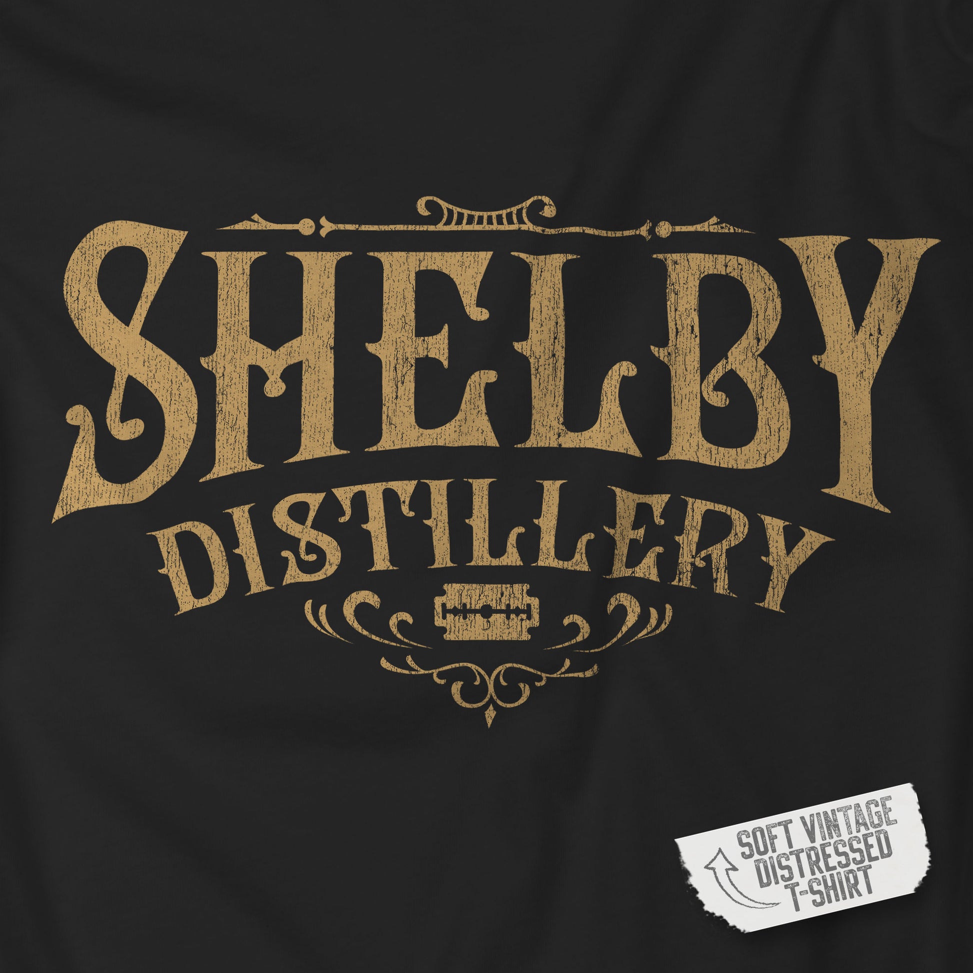 Closeup view of a black Soft Bella+Canvas 3001 short-sleeve t-shirt featuring the Shelby Company Limited Distillery Logo Graphic inspired by the TV show and movie Peaky Blinders in a vintage distressed style, sold by ScriptedBrand.