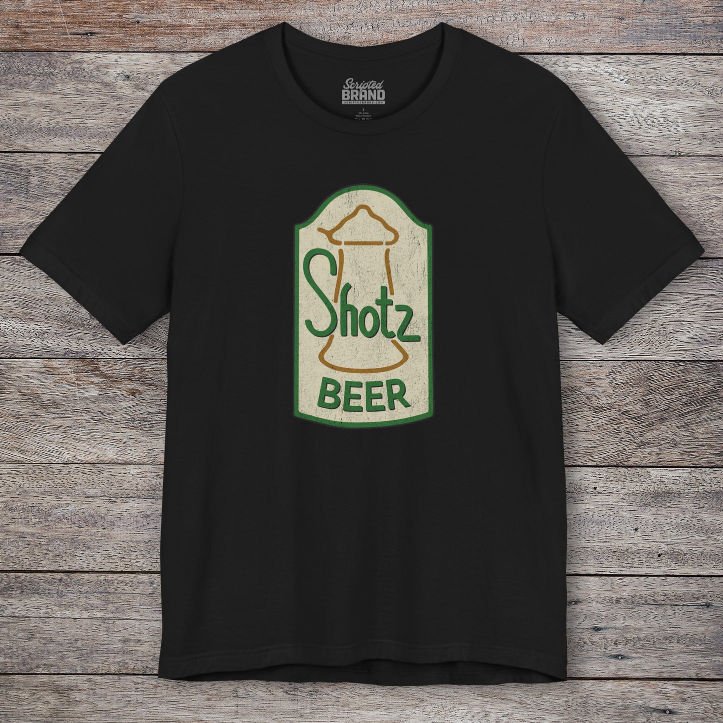 Front view of black t-shirt with vintage Shotz Beer Brewery logo graphic, inspired by TV show Laverne & Shirley.