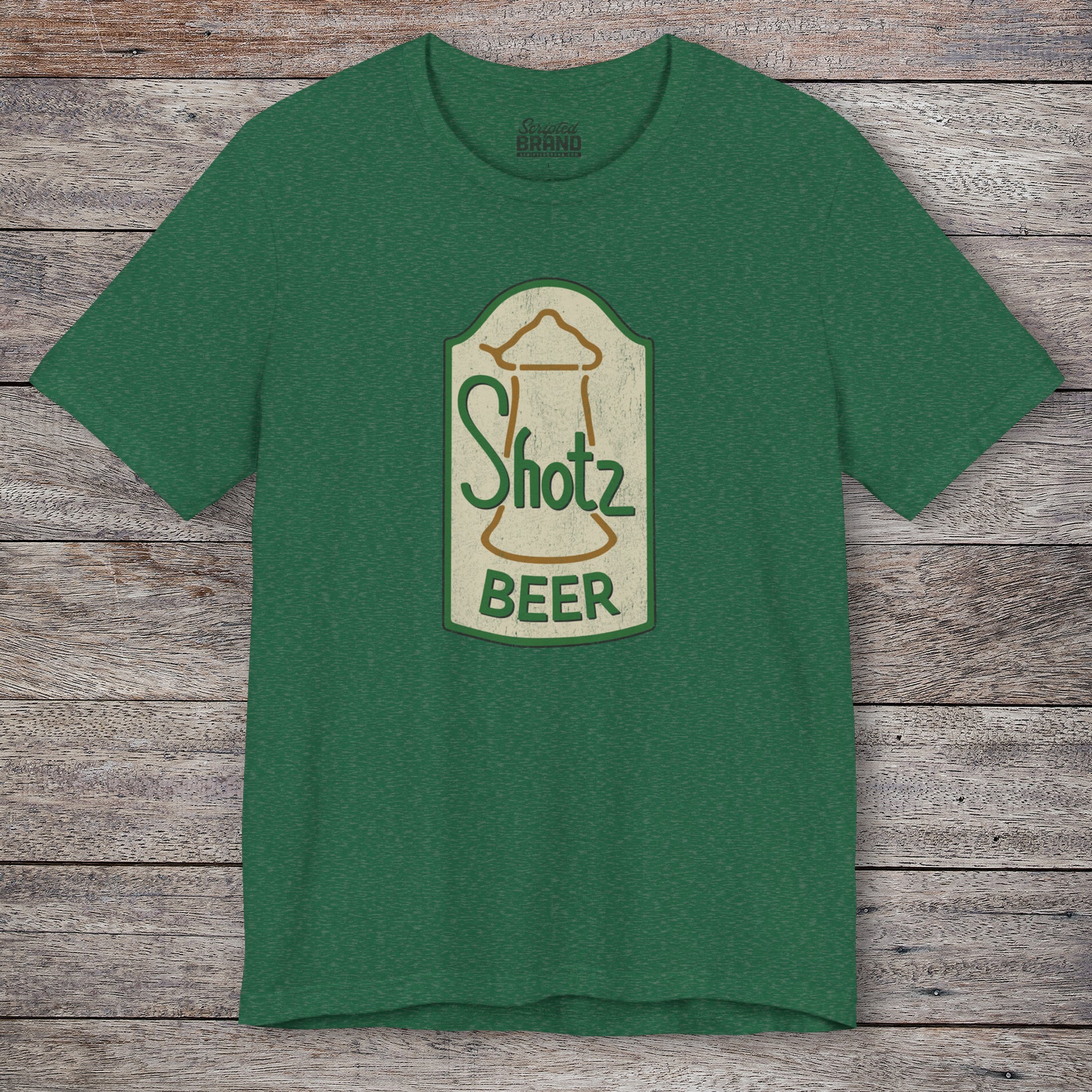 Front view of heather grass green t-shirt with vintage Shotz Beer Brewery logo graphic, inspired by TV show Laverne & Shirley.