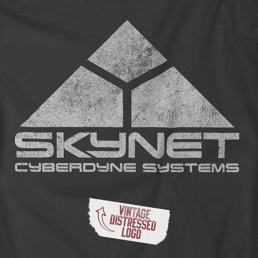 Closeup of Asphalt Gray t-shirt featuring the fictional logo Skynet Cyberdyne Systems from the movie The Terminator in a vintage distressed style.