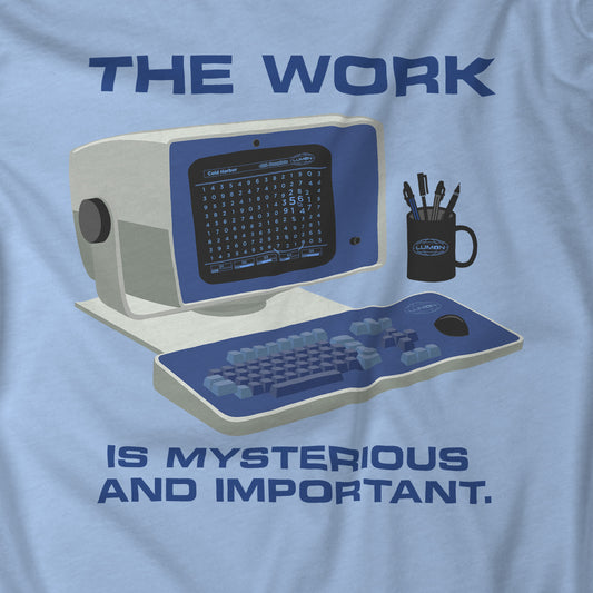 Closeup of a baby blue Soft Bella+Canvas shirtsleeve t-shirt featuring the retro computer workstation from the Apple TV show Severance, and includes the text The Work is Mysterious and Important. Graphic is designed and illustrated by ScriptedBrand.