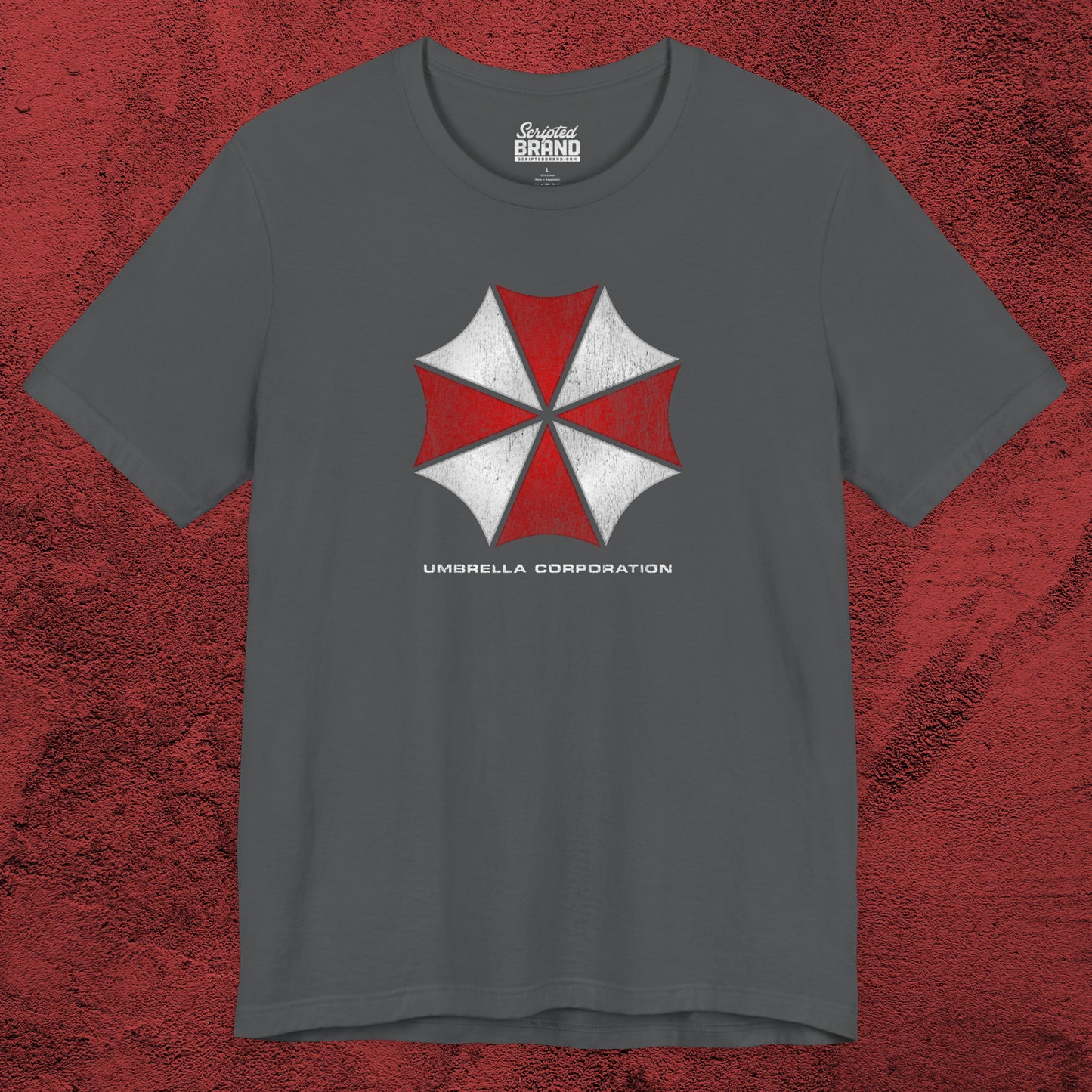 Asphalt gray t-shirt featuring the Umbrella Corp logo from the video game and movie franchise Resident Evil in a vintage distressed style.