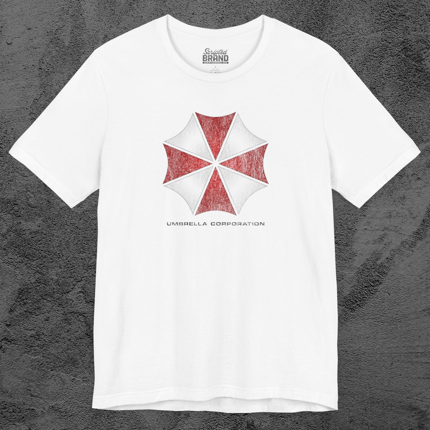 White t-shirt featuring the Umbrella Corp logo from the video game and movie franchise Resident Evil in a vintage distressed style.