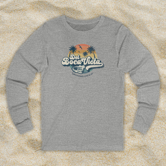 Front view of a athletic heather grey Soft Bella+Canvas 3501 long-sleeve t-shirt featuring a Del Boca Vista logo graphic (uniquely designed by ScriptedBrand), including the phrase Where People Come To Die, inspired by the TV show Seinfeld, in a vintage distressed style.