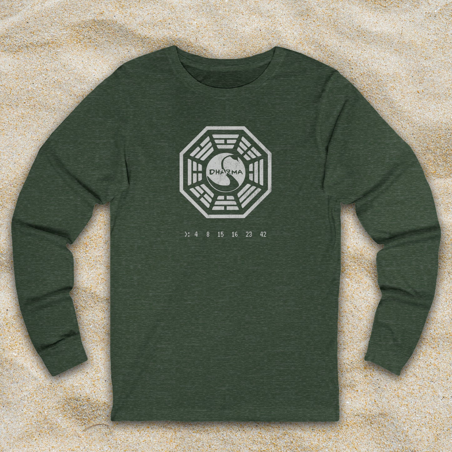 Heather Green blue long sleeve t-shirt with distressed Dharma Initiative Swan Station logo and hatch numbers from LOST, shown on beach sand