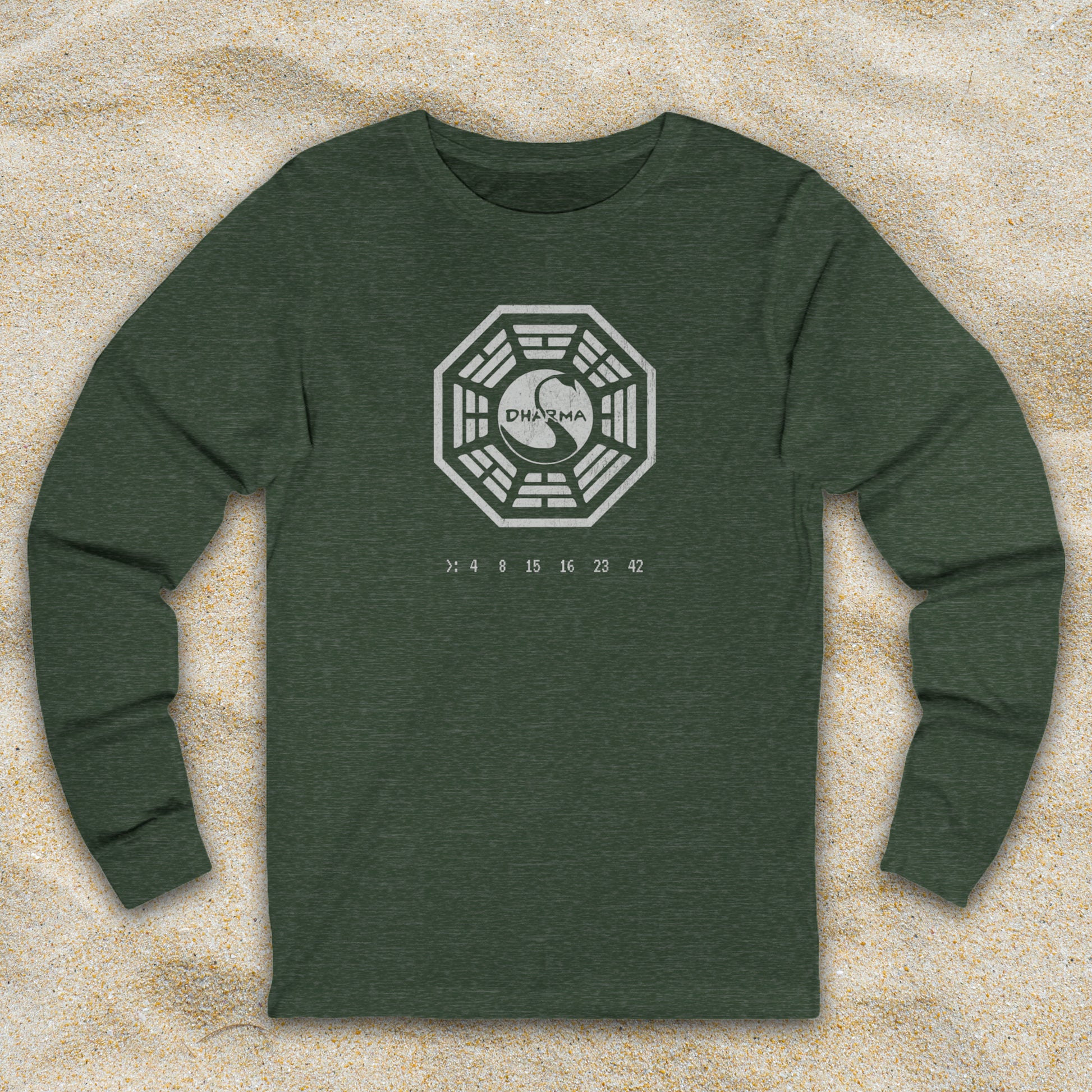 Heather Green blue long sleeve t-shirt with distressed Dharma Initiative Swan Station logo and hatch numbers from LOST, shown on beach sand