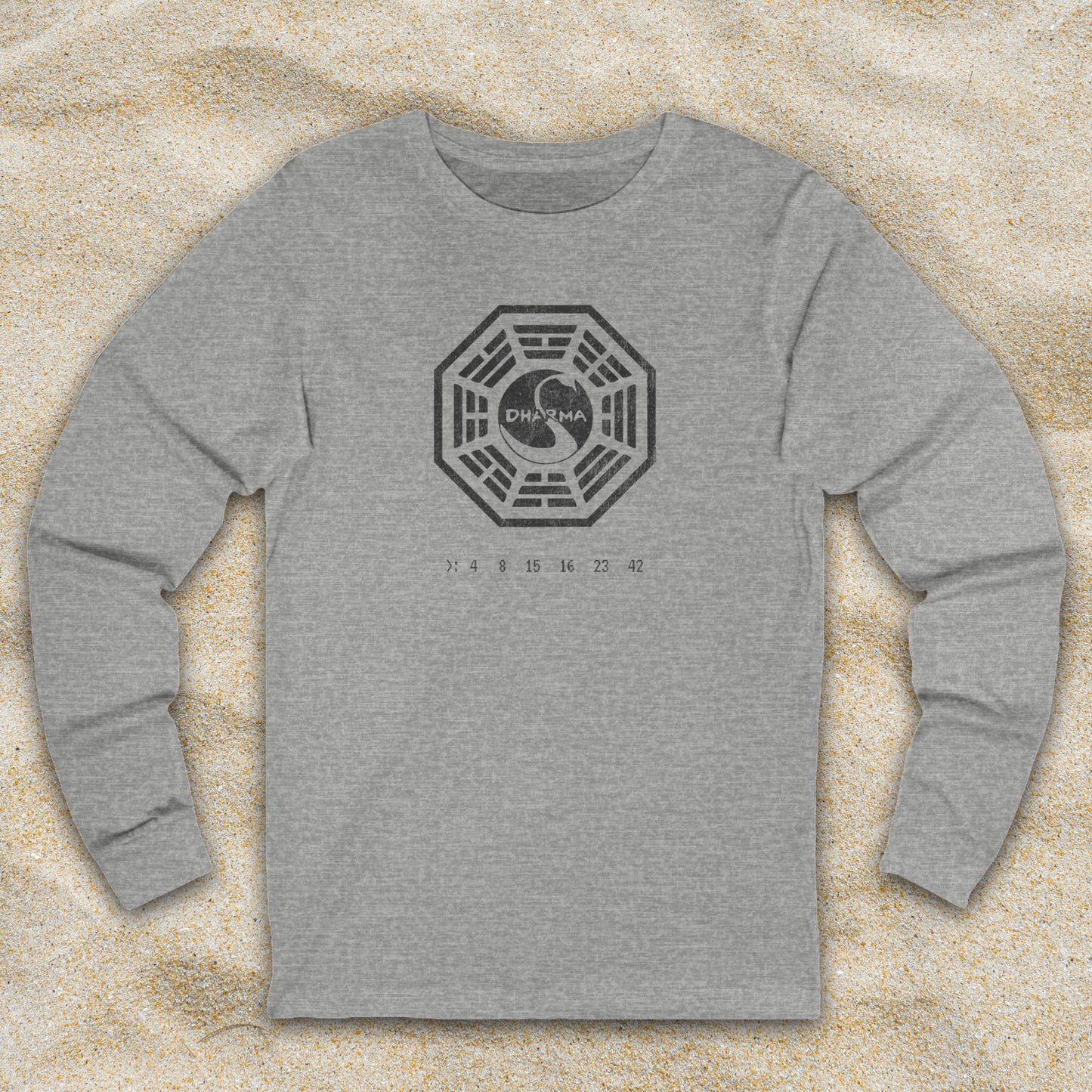 Heather Gray long sleeve t-shirt with distressed Dharma Initiative Swan Station logo and hatch numbers from LOST, shown on beach sand
