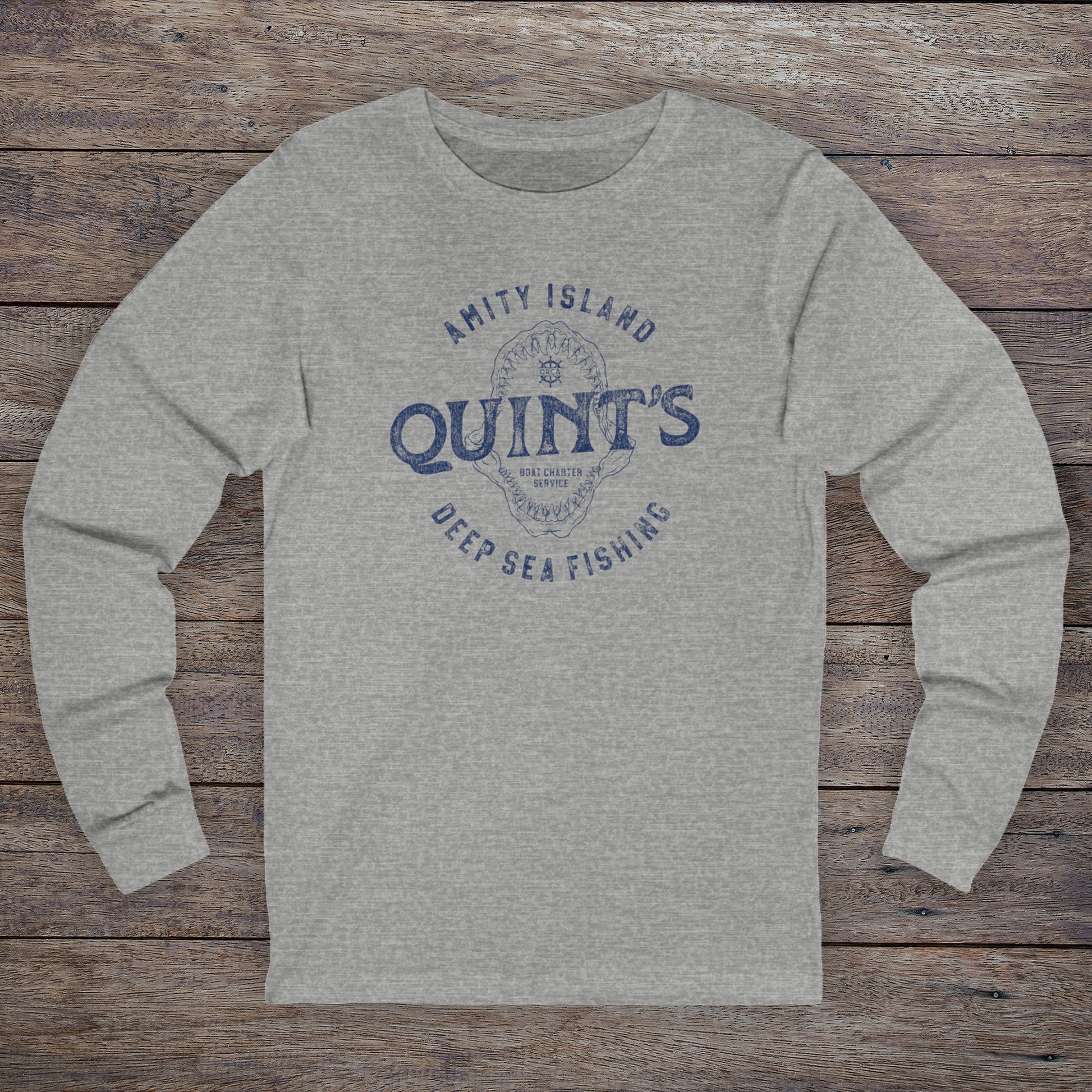 Long-sleeve t-shirt with vintage Quint’s Deep Sea Fishing logo from Jaws, printed on athletic heather grey fabric.