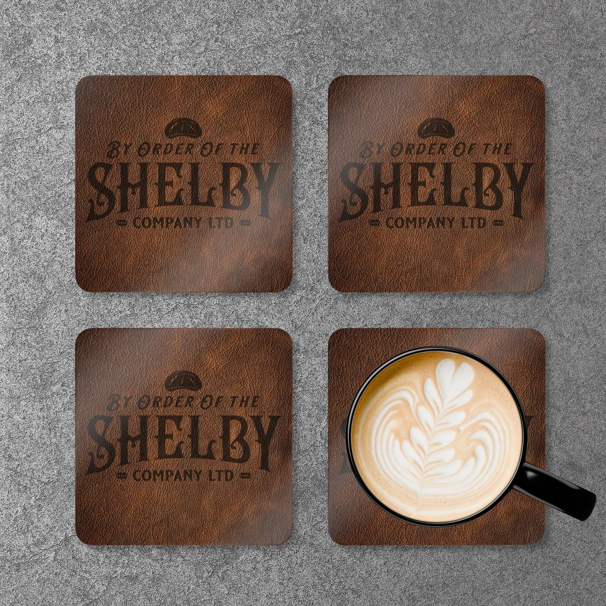 Set of 4 corkwood drink coasters in a grid with Shelby Company LTD logo from Peaky Blinders in vintage leather-style print.