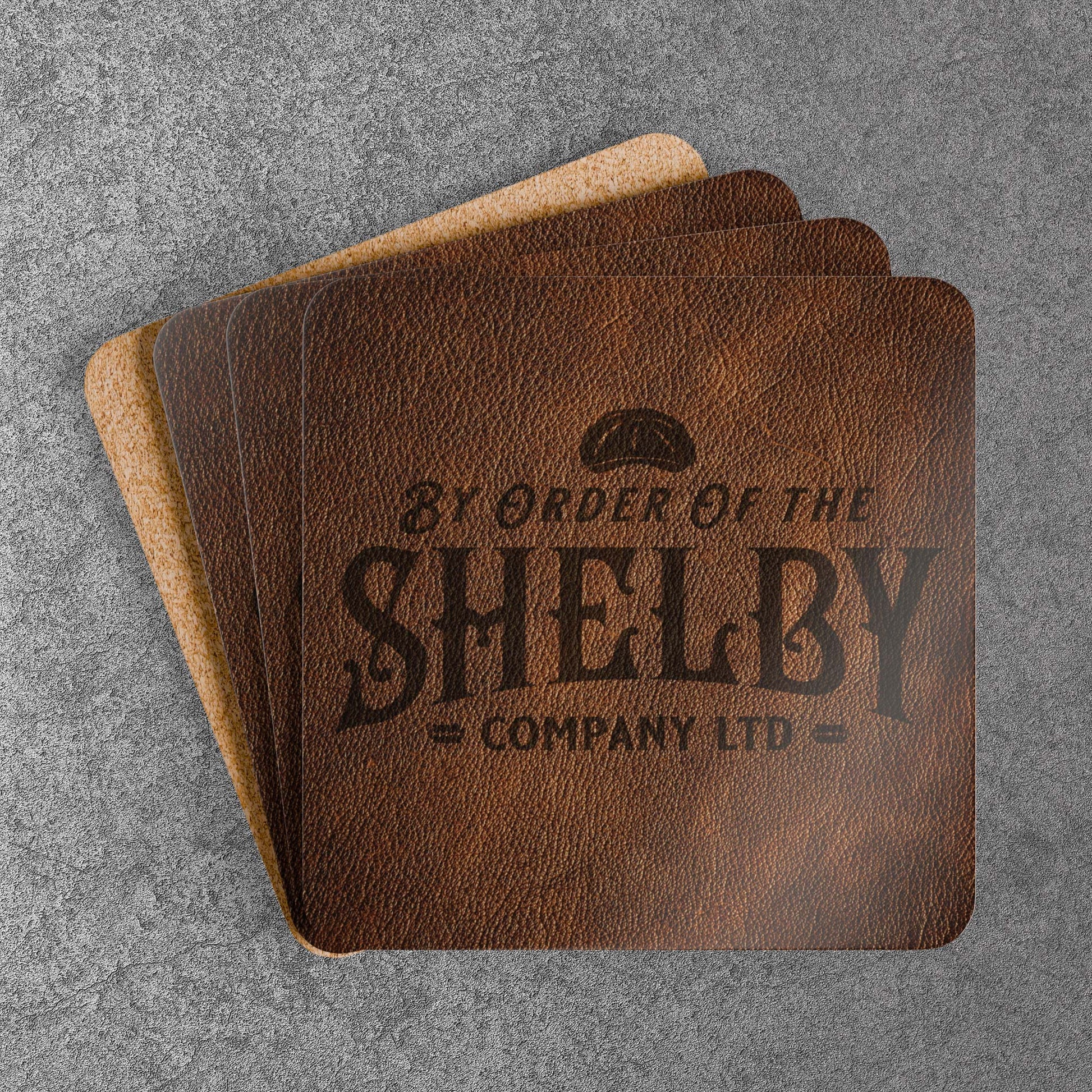 Set of 4 stacked corkwood drink coasters with Shelby Company LTD logo from Peaky Blinders in vintage leather-style print.