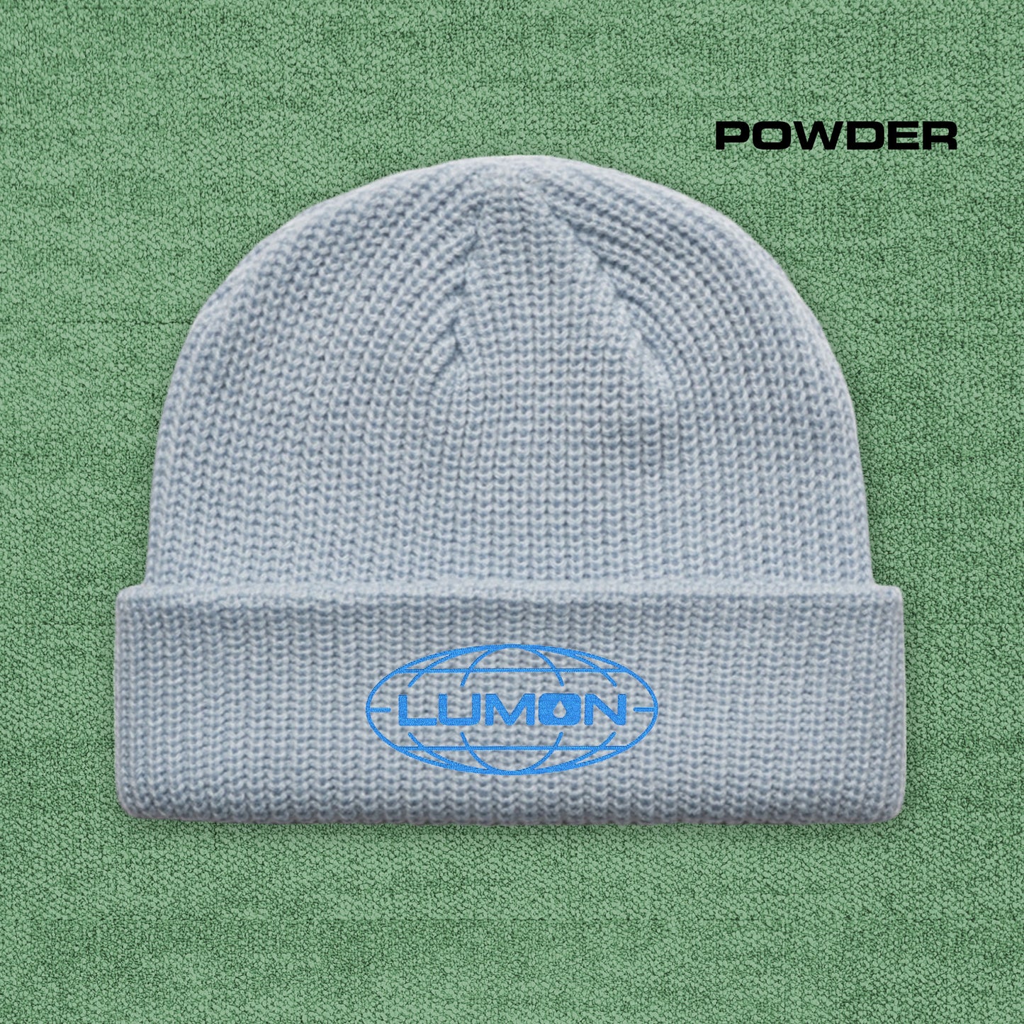 Powder AS Colour cuff beanie with embroidered blue Lumon Industries logo from Severance, fisherman-style ribbed knit hat.