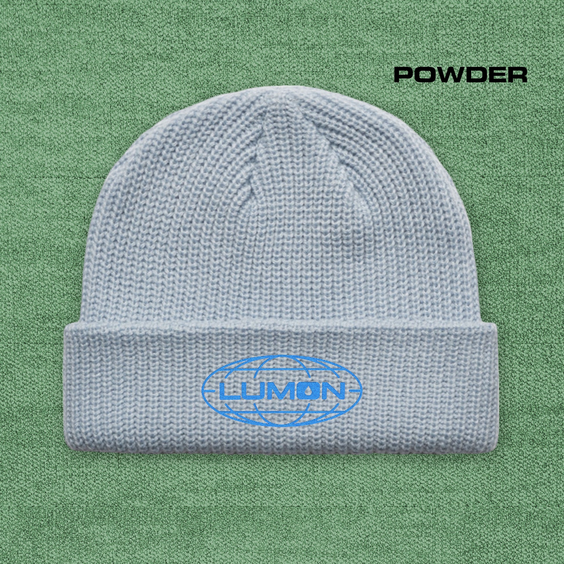 Powder AS Colour cuff beanie with embroidered blue Lumon Industries logo from Severance, fisherman-style ribbed knit hat.