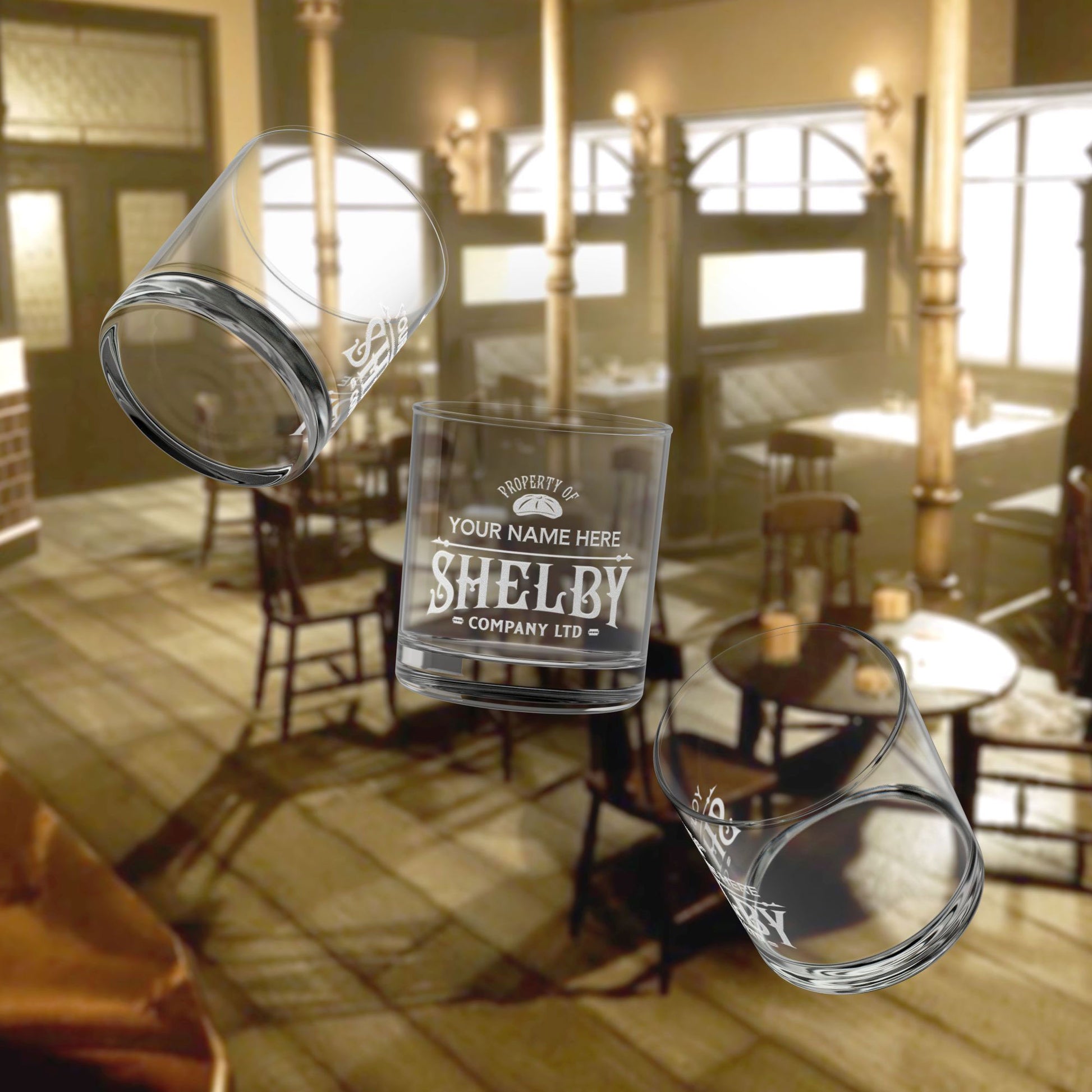 Three floating personalized 10 oz rocks glass with Shelby Company Limited Peaky Blinders inspired logo and custom name.