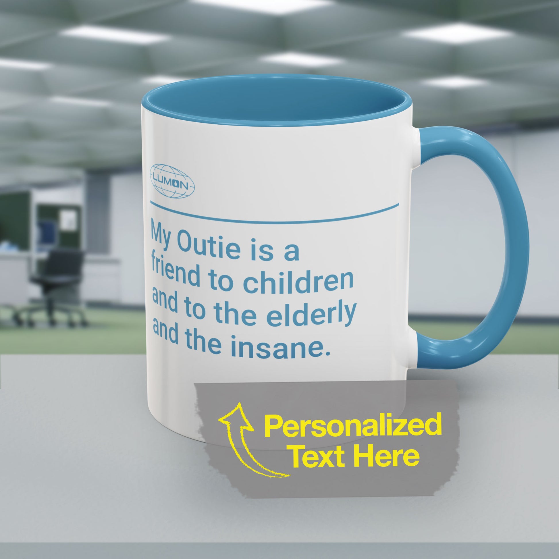 Mockup of a White Ceramic Mug (11 oz or 15 oz) with the blue Lumon Industries logo on one side and customizable text on the other side (up to 120 characters) inspired by the Apple TV show Severance. Custom text is "My Outie is a friend to children and to the elderly and the insane."