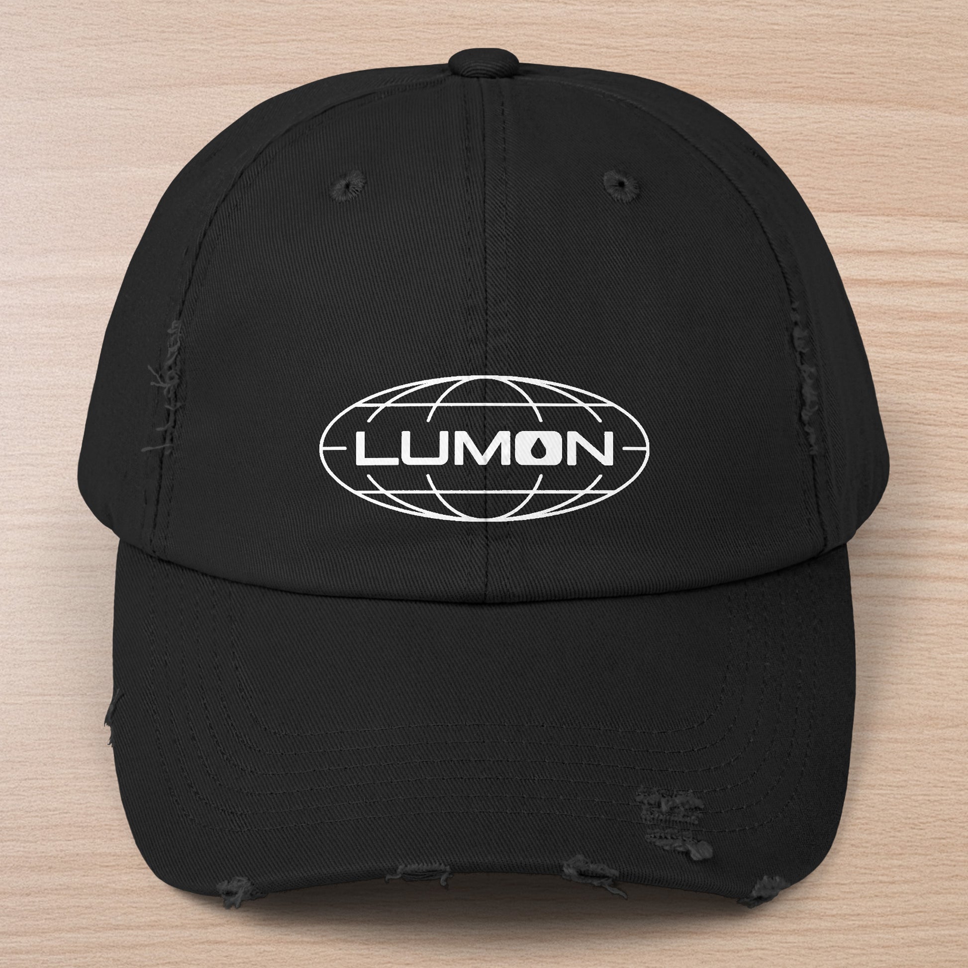Black District DT600 Vintage Distressed Baseball Cap with the Lumon Industries logo from the show Severance.