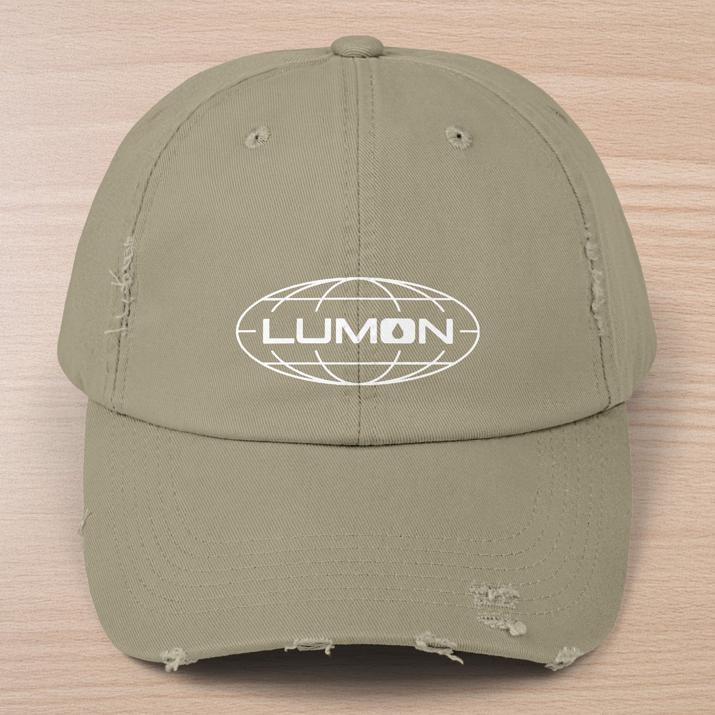 Light Olive District DT600 Vintage Distressed Baseball Cap with the Lumon Industries logo from the show Severance.