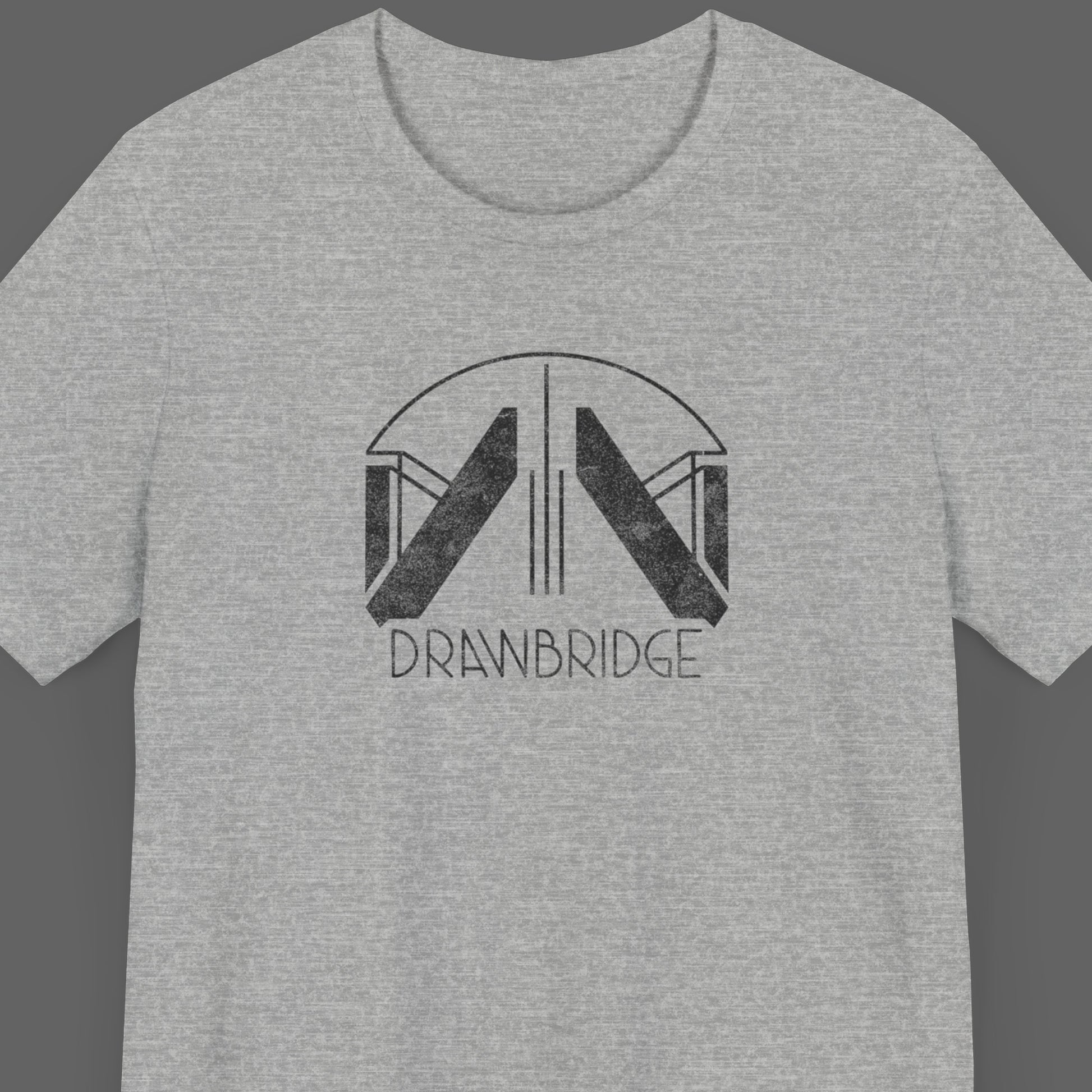 Front view of an athletic heather grey colored soft Bella+Canvas 3001 short-sleeve t-shirt featuring the Drawbridge logo from the video game Death Stranding 2, in a vintage distressed style, sold by ScriptedBrand.