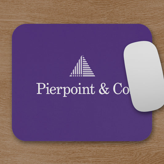 Purple 9x8 mouse pad featuring the Pierpoint & Co. logo inspired by the HBO series Industry, shown on wooden desk with mouse.