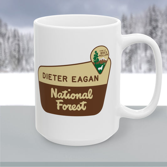 15 oz White ceramic mug with Dieter Eagan National Forest logo, inspired by Woe’s Hollow episode in Severance.
