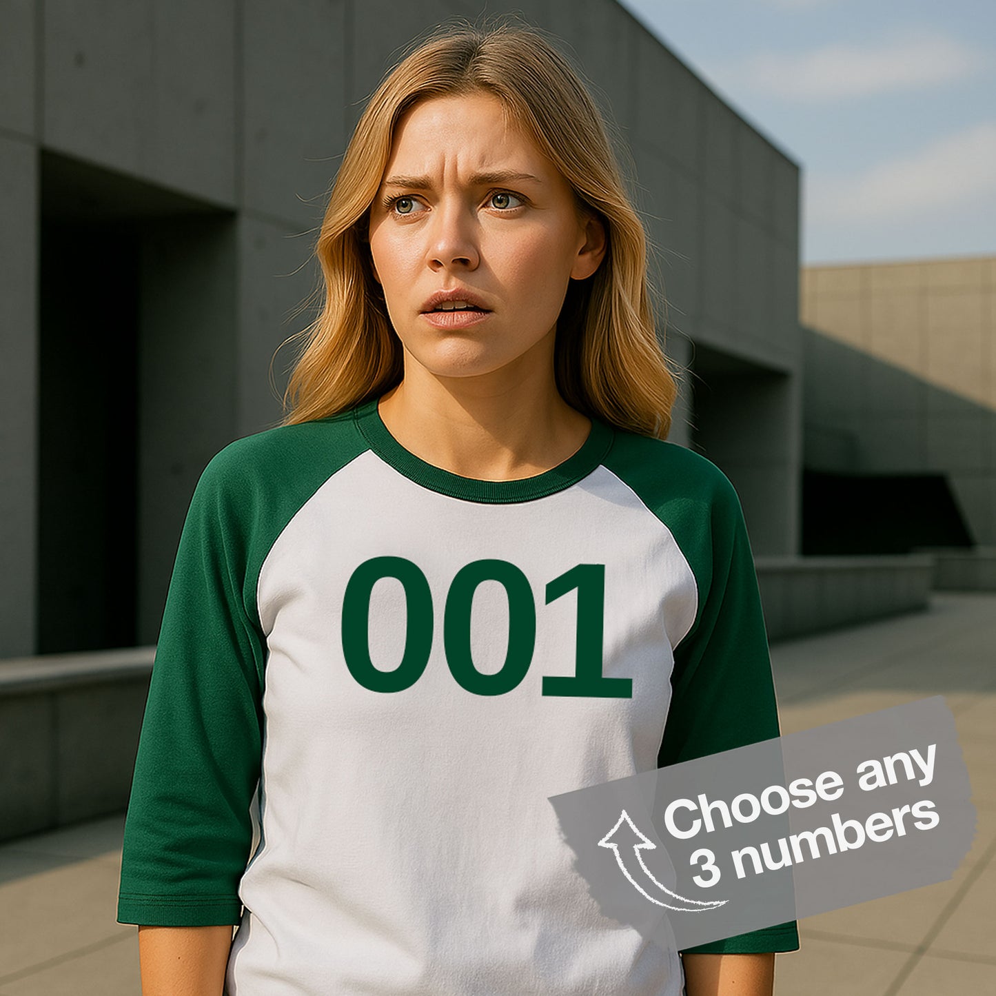 Female model wearing a Green and White colored soft Tultex 245 Unisex Three-Quarter Sleeve Raglan Player T-Shirt featuring the numerals 001 from the popular TV series Squid Game. The shirt can be personalized by the customer to include any three digits.