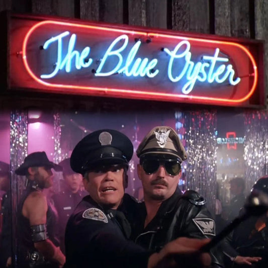 Two men in police uniforms standing in front of a neon sign reading 'The Blue Oyster'.