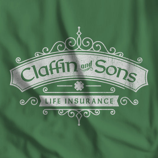 Closeup of Green tee with vintage distressed Claffin and Sons Life Insurance, Bad Sisters TV show graphic